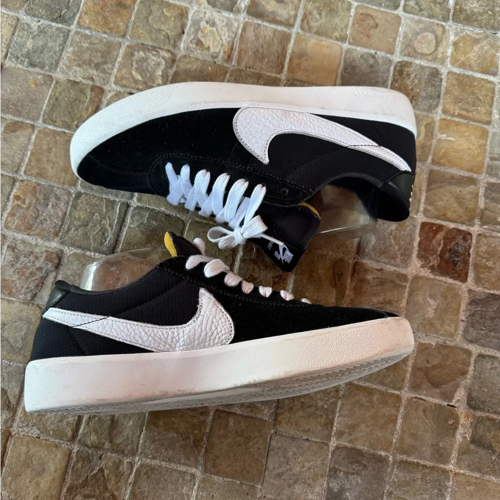 Nike bruin react sb Nike Black and White Athletic Shoes